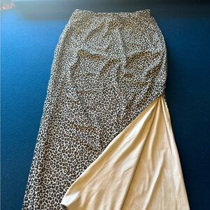 SUPER STYLISH FLATTERING Leopard Print Skirt- fully lined with slit and FUN hem!